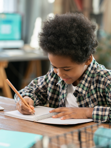 Cute first grader doing homework