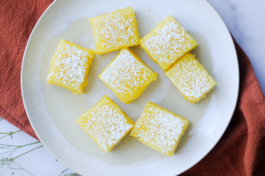 Lemon Bars containing our Vitamin D3 formula on a white plate 